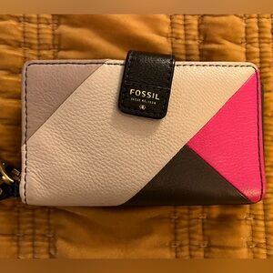 Fossil leather wallet with wristlet strap.